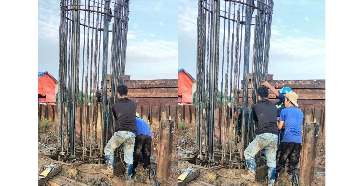 Hạ lồng thép vào hố khoan